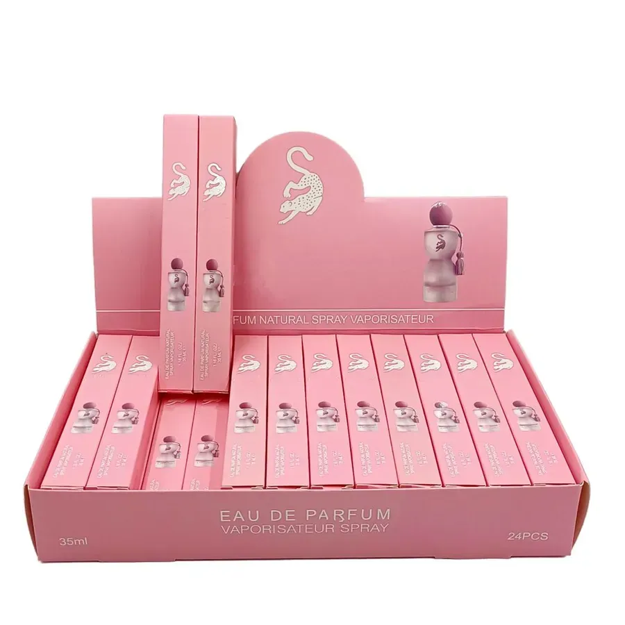 Pink gift box containing a full perfume collection